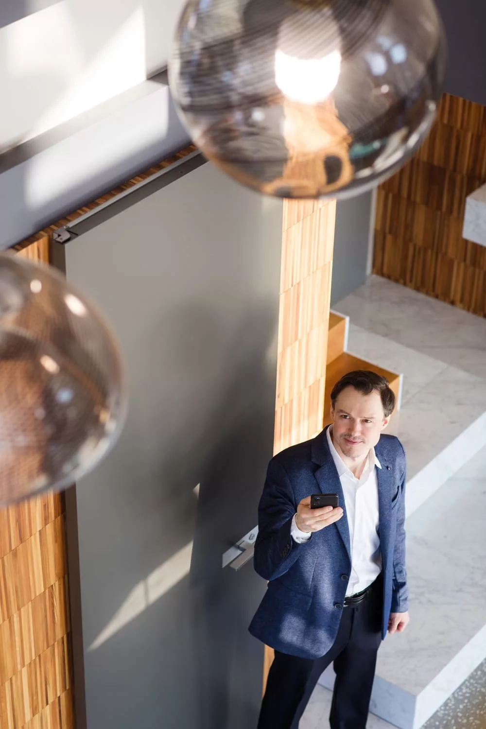 Man controlling lights from the front