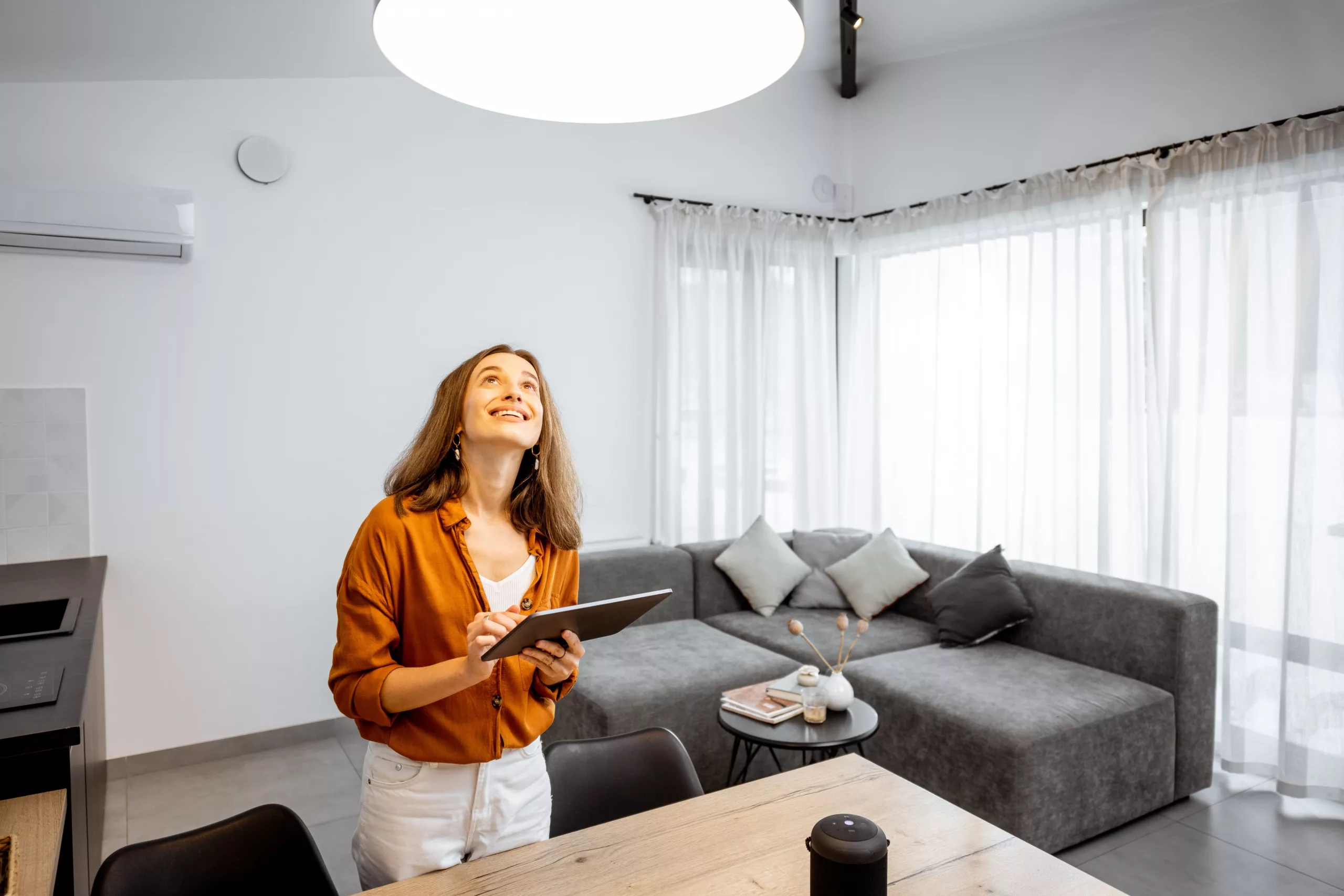 Casambi App Person using lighting controls with the app